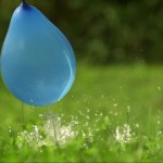945524053-water-balloon-bursting-needle-object-wet